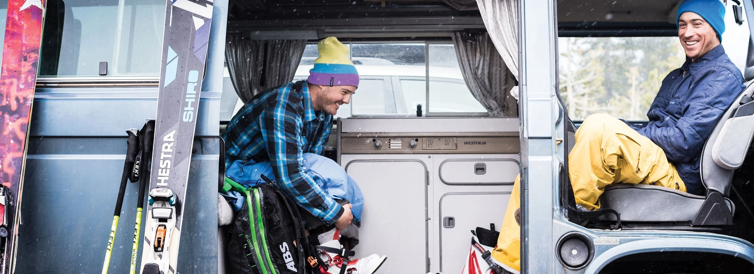 Flylow got its start when co-founders Greg Steen and Dan Abrams, both Colorado natives and friends since college, couldn’t find a pair of ski pants that held up in the backcountry. Check them out sitting in a van.