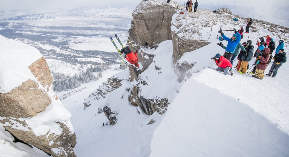 Skier landing a huge backflip at Kings and Queens of Corbets